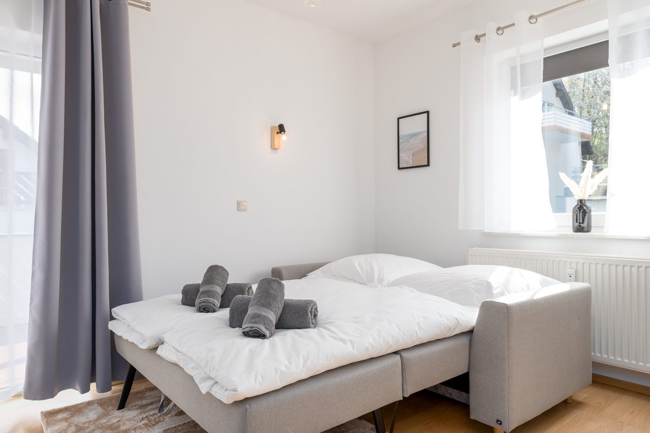 Ferienwohnung Edersee, ausgeklapptes Schlafsofa als zusätzlicher Schlafplatz